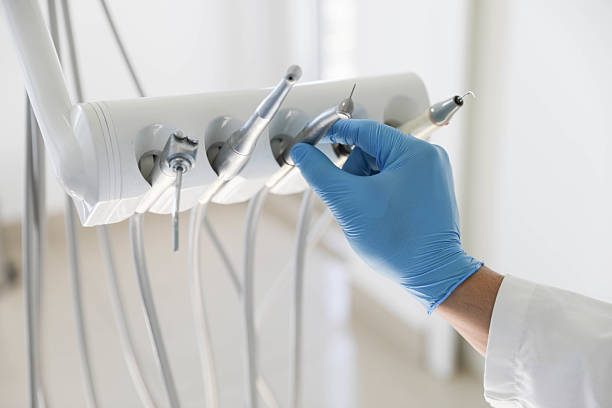 Professional Root Canal Treatment technician working in East Orange, NJ